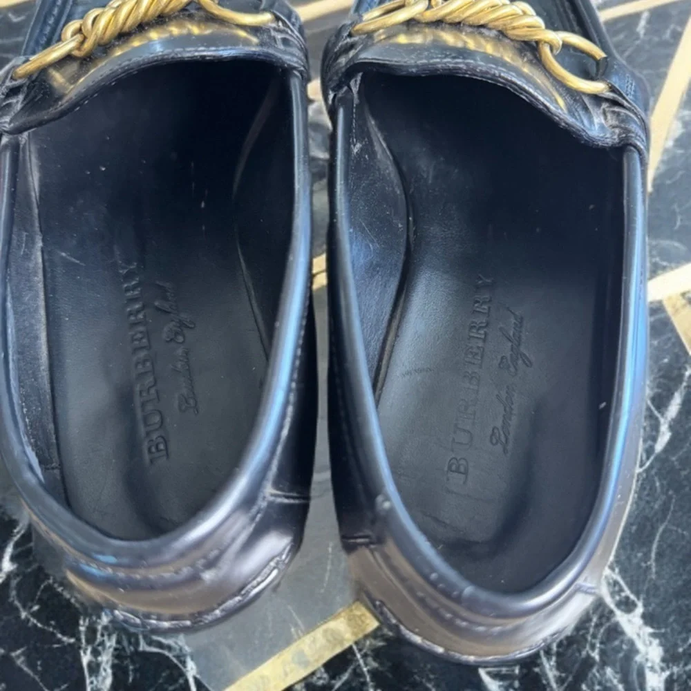 Burberry Black and Gold Slip-On Loafers with Chain Detail